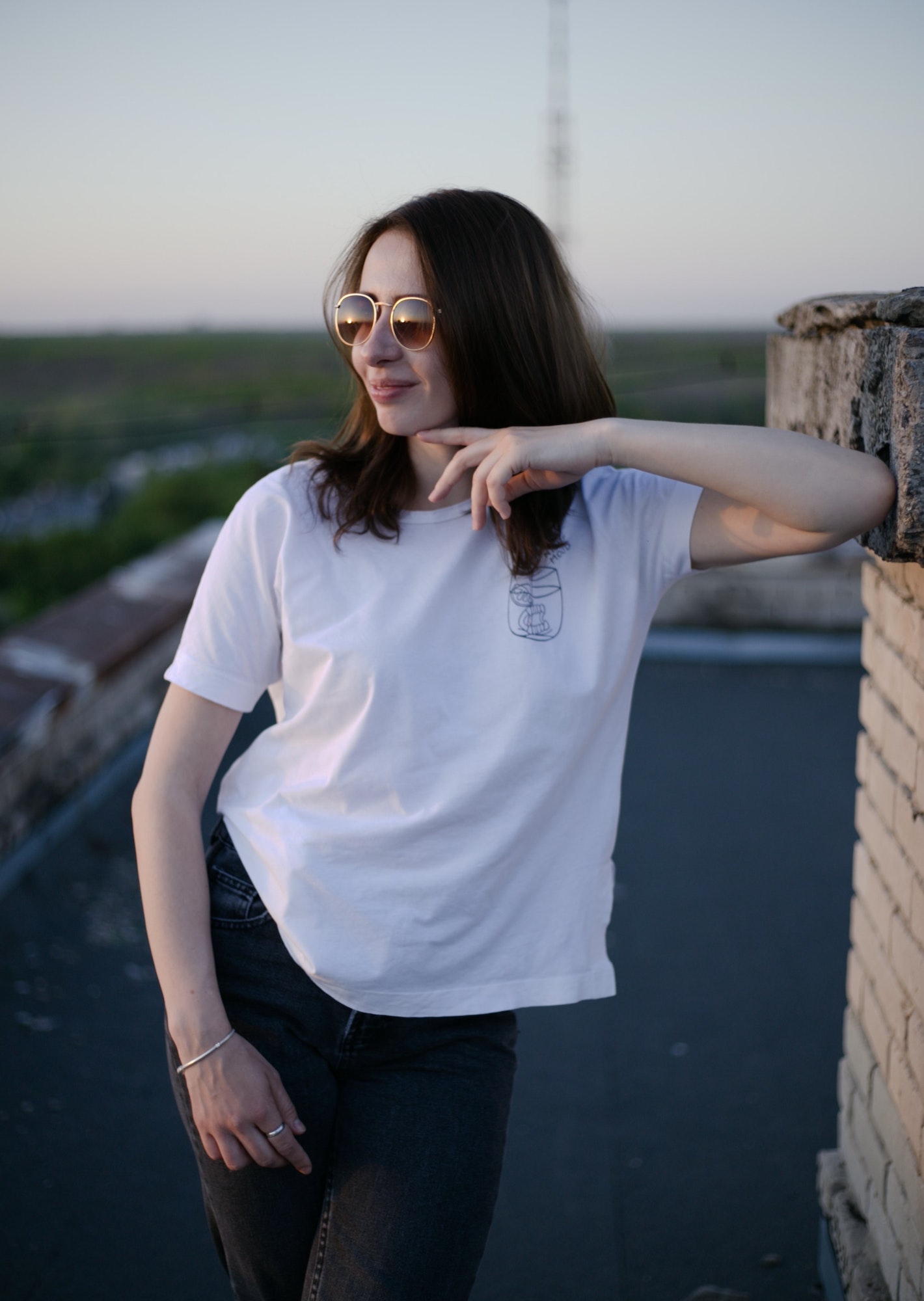 portrait-of-a-young-woman-on-the-roof-of-the-building.jpg